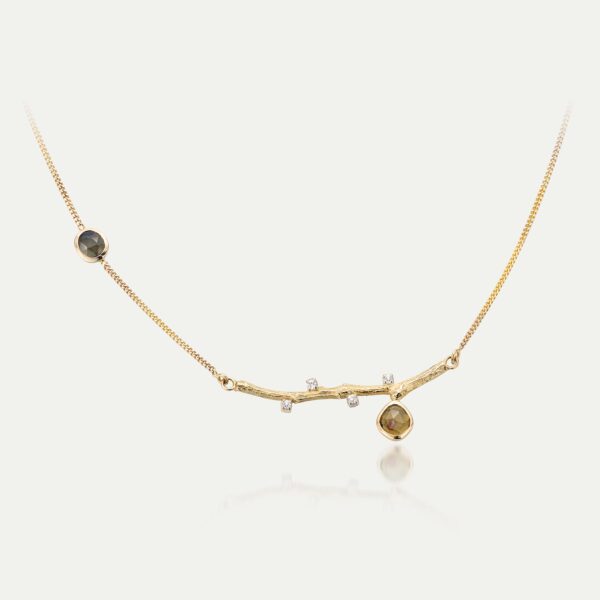 14 kt collier met gouden takje en toermalijn