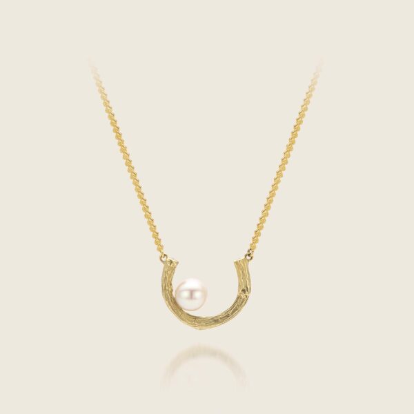 Geelgouden collier met hoefijzer en parel