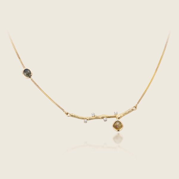 14 kt collier met gouden takje en toermalijn